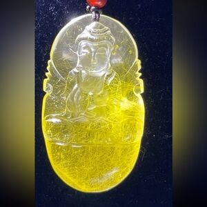 Unusual Rutilated Citrine Buddha Pendant.